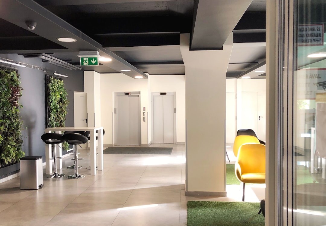 Bright modern office reception area with seating