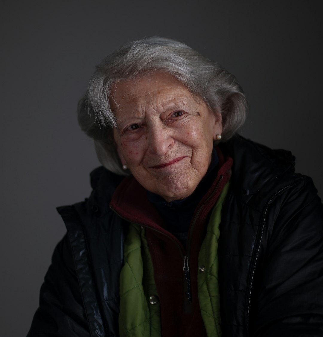 Studio portrait of a woman in her 30s smiling